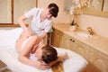 The massage therapist makes a belly massage to a pregnant woman Royalty Free Stock Photo