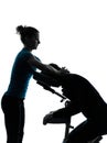 Massage therapy with chair silhouette Royalty Free Stock Photo