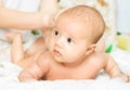 Massaging baby Royalty Free Stock Photo