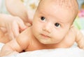 Massaging baby Royalty Free Stock Photo