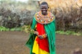 Massai woman standing in her village Royalty Free Stock Photo