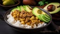 Massaman curry with avocado, potatoes, and beef served over rice