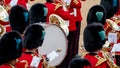 Massed band at the Trooping the Colour parade at Horse Guards, London UK, with reflection in the trumpet.