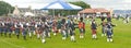 Massed Pipe bands marching at Nairn. Royalty Free Stock Photo