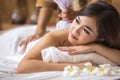 Masseur doing massage on asia woman body