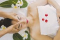 Masseur doing massage the head of an Asian woman Royalty Free Stock Photo