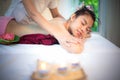 Masseur doing massage spa with treatment sugar scrub on Asian woman body in the Thai spa lifestyle, Royalty Free Stock Photo