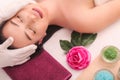 Masseur doing massage on woman body in the spa salon. Beauty treatment concept Royalty Free Stock Photo