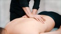 The masseur doing sports health massage of back for sportsman Royalty Free Stock Photo