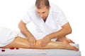 Masseur giving anti cellulite leg massage