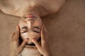 Masseuse hands doing Face Massage Royalty Free Stock Photo