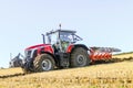 Massey Ferguson 7726 ploughing on stubble in crop field Royalty Free Stock Photo