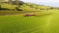 Massey Ferguson 4255 tractor spreading slurry in field Royalty Free Stock Photo