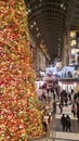 Massive Christmas Tree Lighting The Way for Shoppers in a Mall