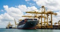 Large Container Ship Docked at a Busy Port with Yellow Cranes and Other Ships cargo ship vessel Royalty Free Stock Photo