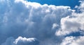 Massive cumulus cloud formation at the bright blue sky Royalty Free Stock Photo