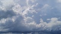 Massive cumulus congestus clouds accumulating in the atmosphere, indicating potential storm development and high humidity levels Royalty Free Stock Photo