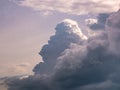 Massive and dark clouds Cumulus Congestus or Towering Cumulus rising high into the sky Royalty Free Stock Photo