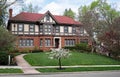 Massive English Tudor Home with Spring Landscape