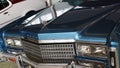 Massive front mask and twin square headlights of american luxury car Cadillac Eldorado, ninth generation from year 1978