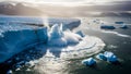 A massive glacier calves into the ocean creating a huge splash and waves under a dramatic sky Royalty Free Stock Photo