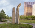 Massive granite sculpture titled `Bishop`s Triad` by Dimitri Hadzi in downtown Dallas, Texas.