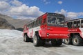 Massive Ice Explorers, specially designed for glacial travel, take tourists in the Columbia Icefields, Canada