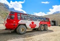 Massive Ice Explorers, specially designed for glacial travel, take tourists onto the surface of the Athabasca Glacier Royalty Free Stock Photo