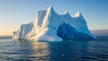 Massive Iceberg Floating in Calm Ocean Waters Under Clear Blue Sky Royalty Free Stock Photo