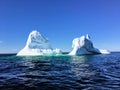 A massive iceberg floating off the coast of Twilingate, Newfoundland and Labrador, Canada. The iceberg floats in the vast open