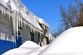 Massive icicles hang from a building
