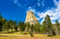 Devils Tower National Monument and pine forest in Wyoming, USA Royalty Free Stock Photo