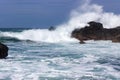Massive implacable waves of the Pacific Ocean crash upon the unbreaking volcanic rock of Costa Rica`s Playa San Janillo.