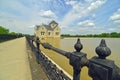 Massive iron railing leading to beautiful water work building