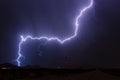 Massive lightning bolt in the night sky