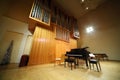 Massive pipe organ and concert grand piano