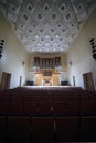 Massive pipe organ in empty concert hall