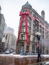 A Massive Red Bow is Tied Around A Building In Boston