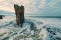 A massive rock formation protrudes boldly from the ocean, dominating the surrounding waters, A towering view of a solitary sea