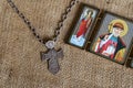 A massive silver pectoral cross with the image of the Archangel Michael and an Orthodox icon Royalty Free Stock Photo