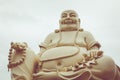 Massive statue of the Sitting Smiling Buddha at the Vinh Tranh P