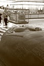 Hermitage Museum. Ancient Egyptian stone sarcophagus, close-up. Black and white photo, sepia