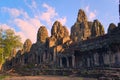 Massive stone face towers at Bayon temple, located in Angkor, Cambodia, the ancient capital of the Khmer empire. View from norther Royalty Free Stock Photo