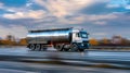 A massive tanker truck laden with fuel barrels rumbles down a bustling highway, embodying strength and power on its journey to