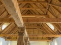 Massive timber structure timberwork of roof on old baroque farm house made