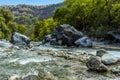 Massive volcanic boulders lie along the river bed of the Alcantara river near Taormina, Sicily Royalty Free Stock Photo