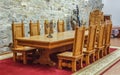 Massive wood table and chairs - Fagaras citadel - Cetatea Fagaras Romania Royalty Free Stock Photo