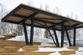 A massive wooden canopy from the sun, rain and snow on the observation platform.