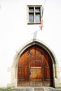 Massive wooden door. Architectural detail in Alba Iulia. Royalty Free Stock Photo