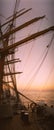 The 4-mast barque tall ship went to drift in calm sea on a sunset Royalty Free Stock Photo